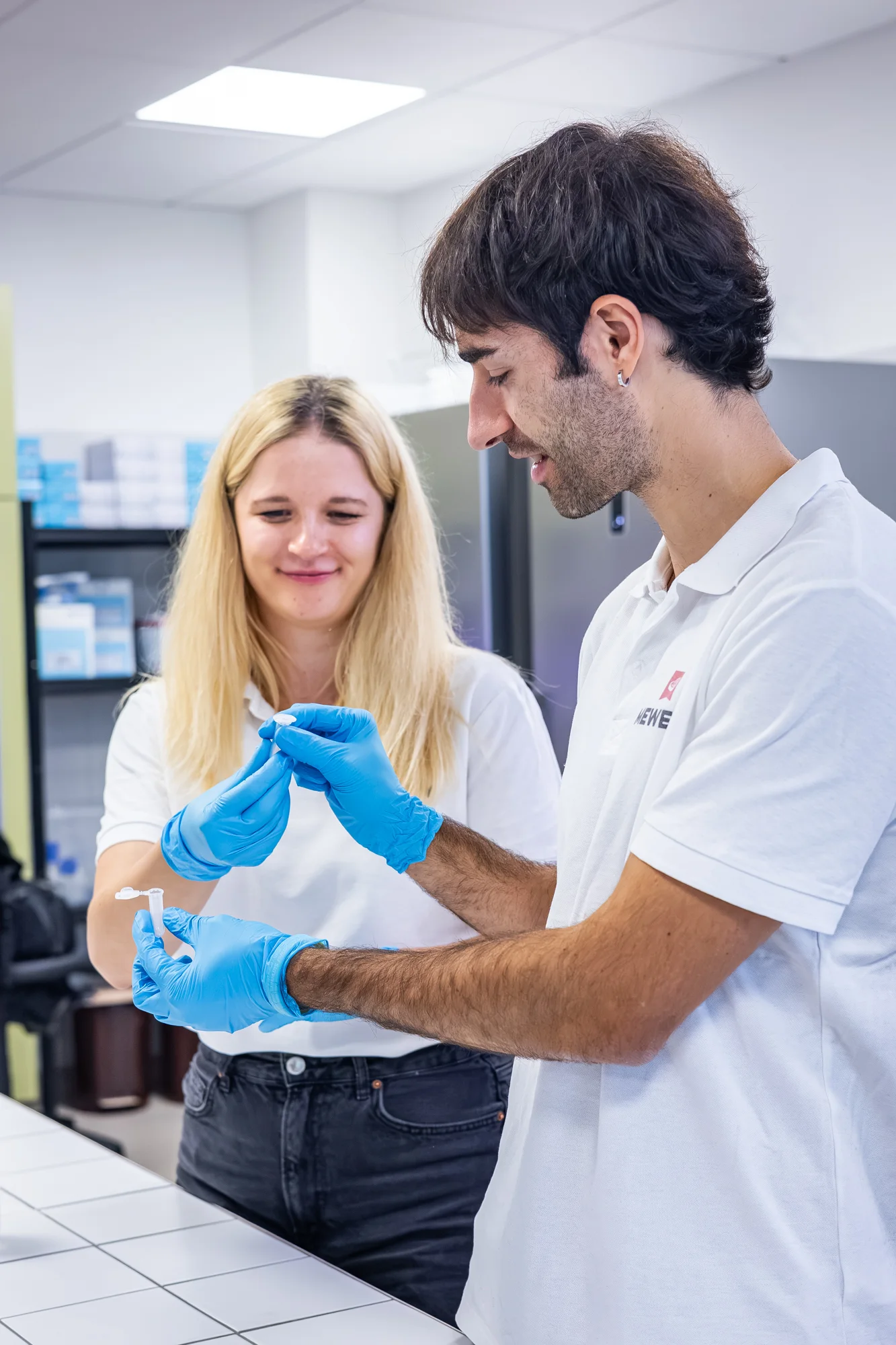 Mewery scientists working together in the Brno laboratory